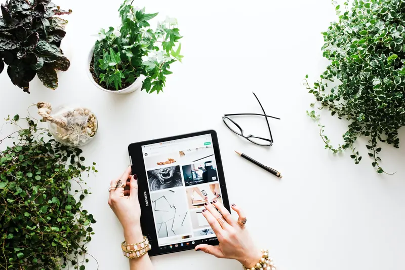 Lifestyle product flat lay with a tablet