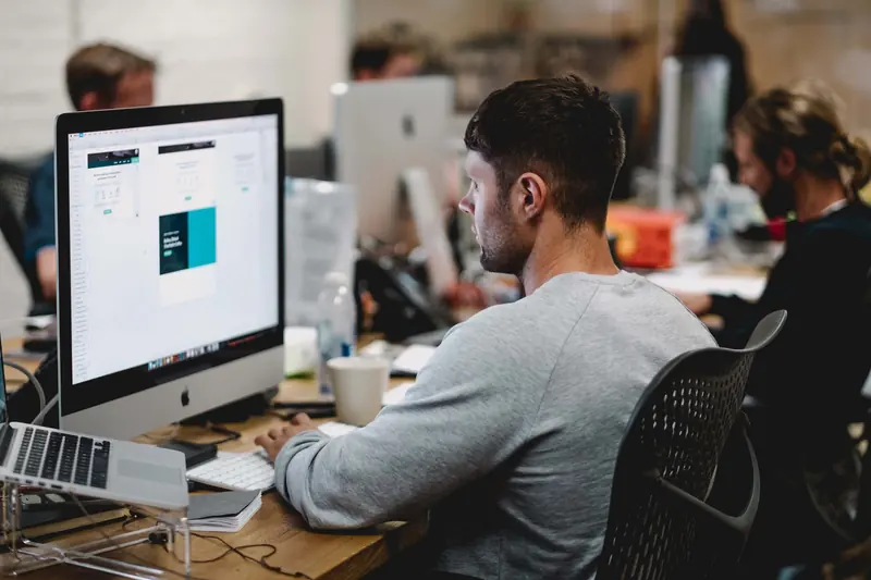 Small business team working on computers