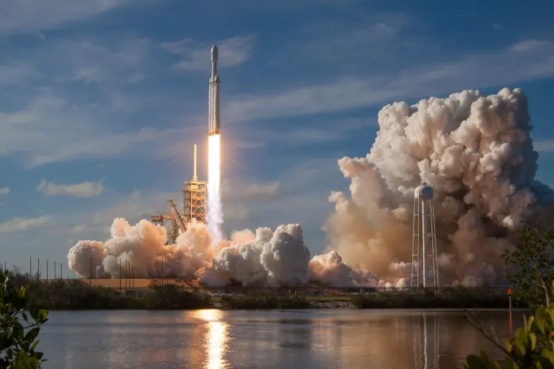 Rocket lifting off into the sky